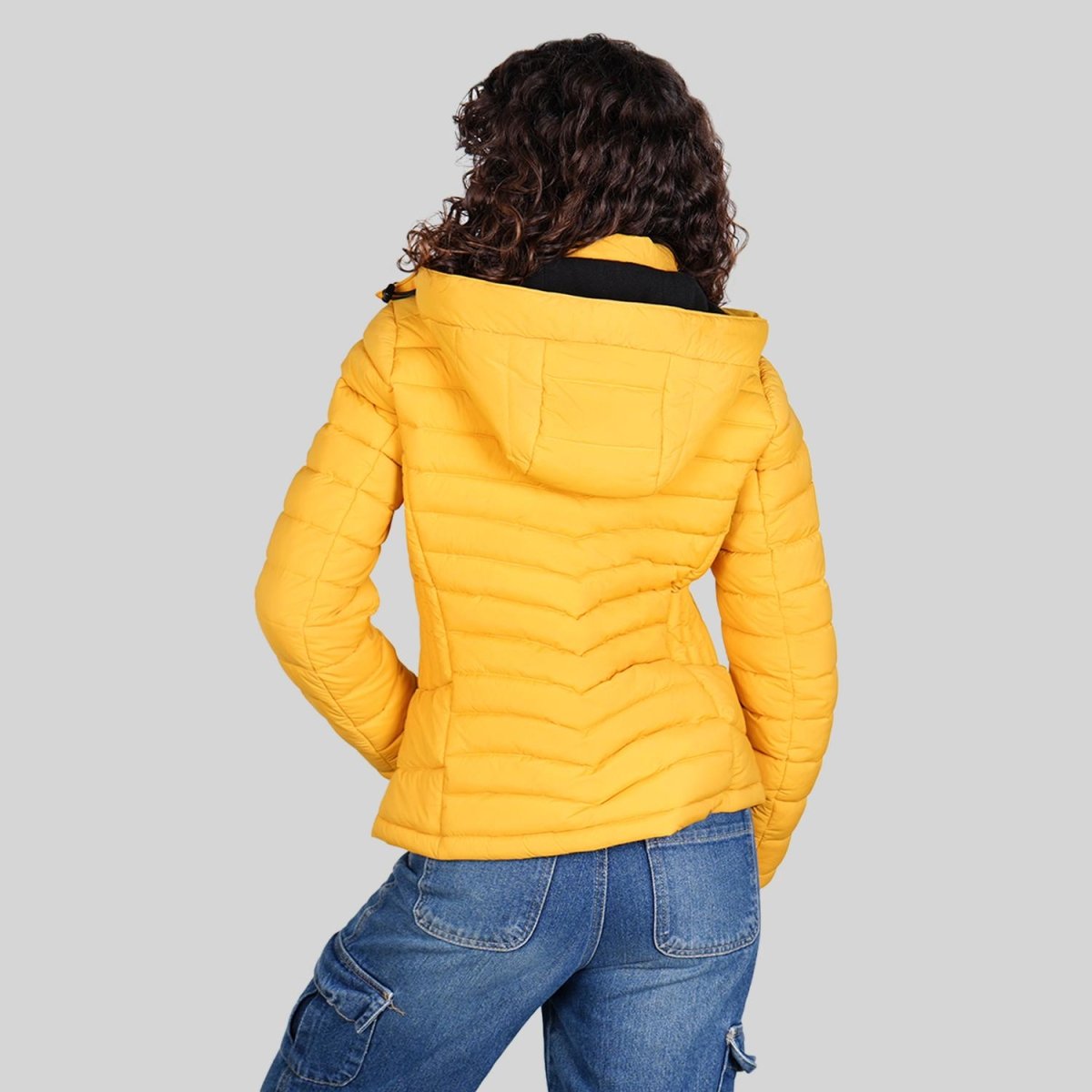 Chamarra capitonada para mujer con cuello alto y bolsillos a los costados Greenlander - Greenlander