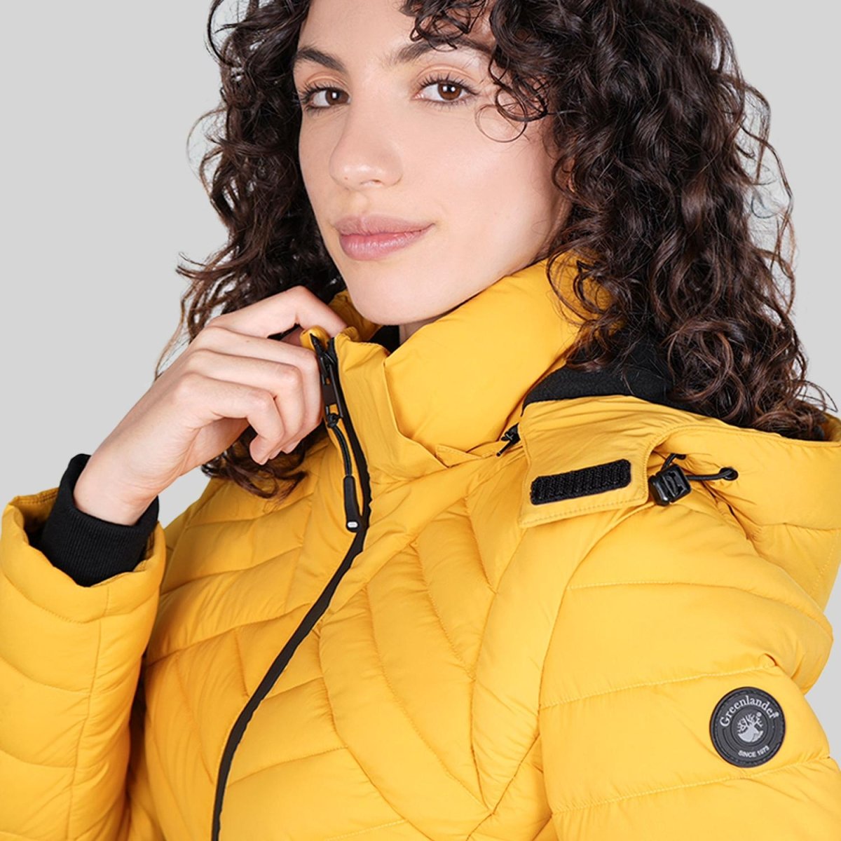 Chamarra capitonada para mujer con cuello alto y bolsillos a los costados Greenlander - Greenlander