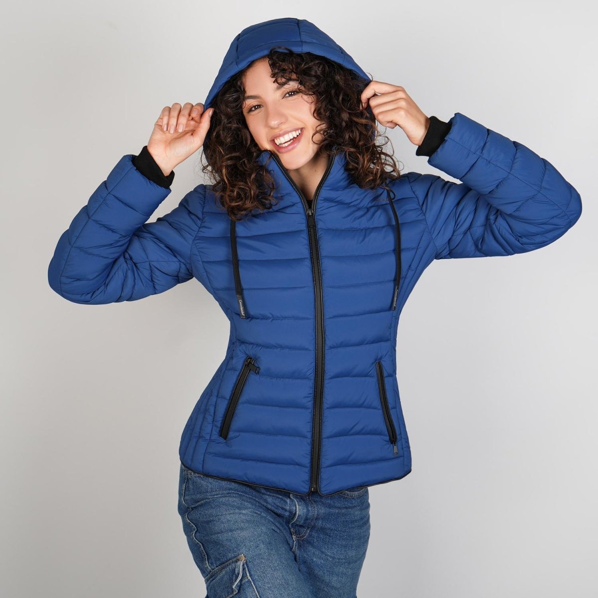 Chamarra capitonada para mujer con cuello alto y gorro desmontable Greenlander - Greenlander