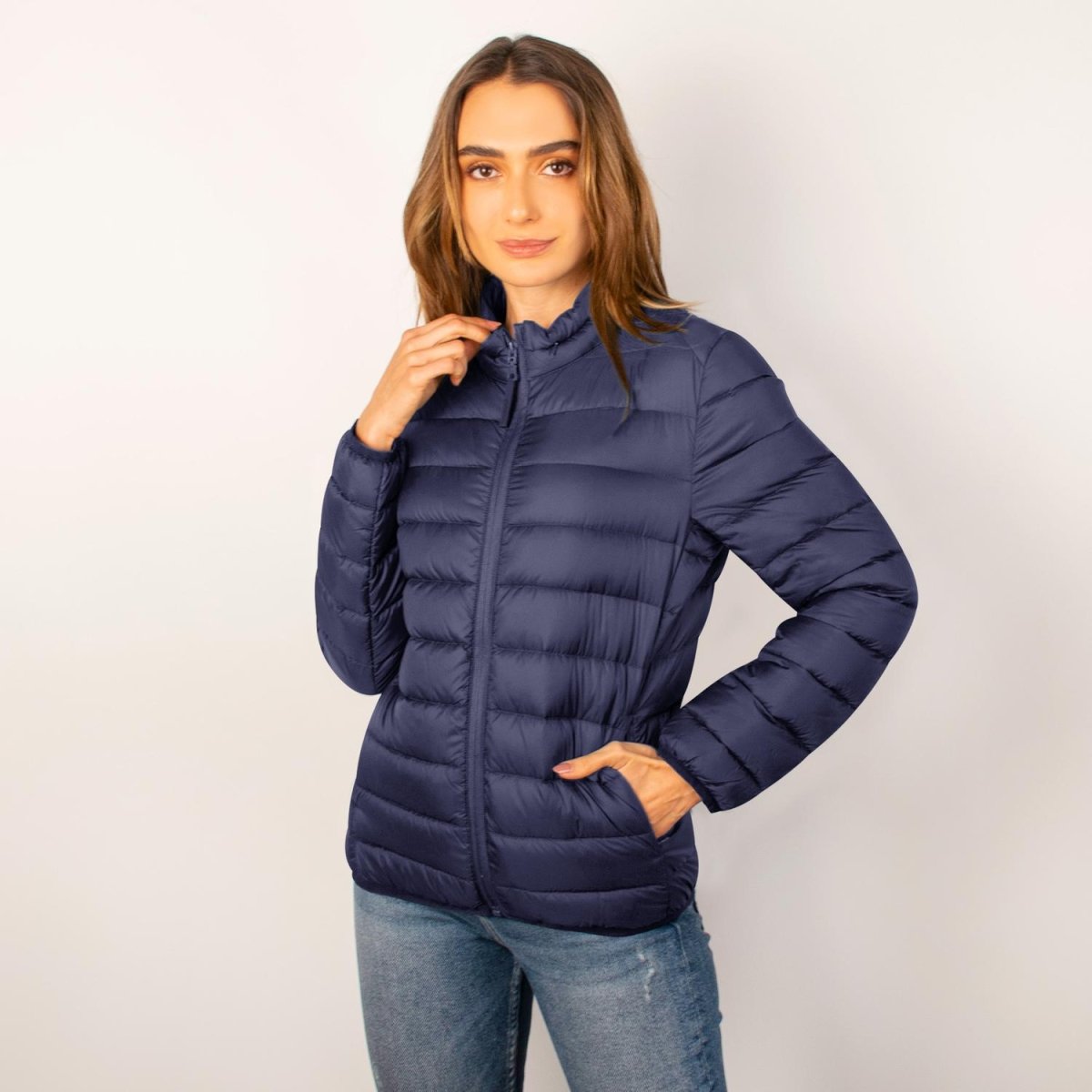 Chamarra capitonada para mujer, empacable con gorro oculto Greenlander - Greenlander